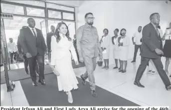  ?? ?? President Irfaan Ali and First Lady Arya Ali arrive for the opening of the 46th regular meeting of the Conference of Heads of Government of the Caribbean Community yesterday at the National Cultural Centre.