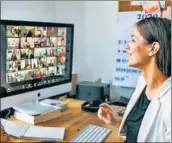  ?? SHUTTERSTO­CK ?? A woman attends a virtual meeting