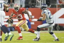  ?? Marcio Jose Sanchez / Associated Press 2015 ?? Running back Reggie Bush, shown with the 49ers in 2015, won a $12.5 million court decision against the Rams.