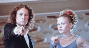  ?? RICHARD CARTWRIGHT/TOUCHSTONE ?? Heath Ledger and Julia Stiles update “The Taming of the Shrew” in 1999’s “10 Things I Hate About You.”