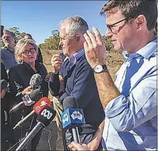  ?? PHOTO: DUBBO PHOTO NEWS ?? Prime Minister Malcolm Turnbull, centre, was questioned about Barnaby and Vikki by the Sydney tabloid media during his media conference at Trangie this week. The local media, on the other hand, were more interested in the reason the PM came to our...