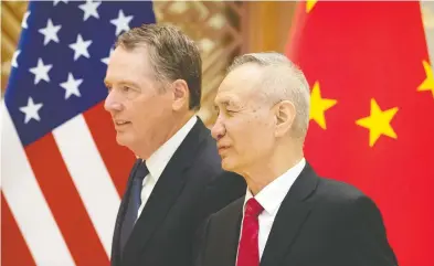  ?? MARK SCHIEFELBE­IN / AFP / GETTY IMAGES ?? U.S. Trade Representa­tive Robert Lighthizer, left, with Chinese Vice Premier Liu He in February in Beijing.
Liu will be joined in the China-U.S. negotiatio­ns by Chinese Commerce Minister Zhong Shan, a perceived hardliner.