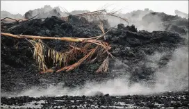  ?? MARIO TAMA / GETTY IMAGES ?? Lava cools in Leilani Estates in the aftermath of the Kilauea volcano eruption on Hawaii’s Big Island on Thursday.