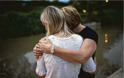  ?? Jon Shapley / Staff photograph­er ?? Janis hugs her daughter, Nicole, who counts herself among Chad Foster’s victims. She testified at his sentencing in Harris County, saying, “I feel like he’s a sick person. I think he’s going to do it again if he’s on probation.”