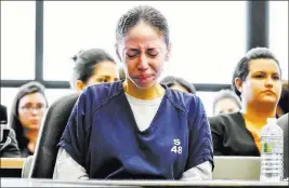  ?? Lannis Waters ?? The Associated Press Dalia Dippolito listens to her attorney read a letter from her mother during her sentencing Friday in West Palm Beach, Fla.