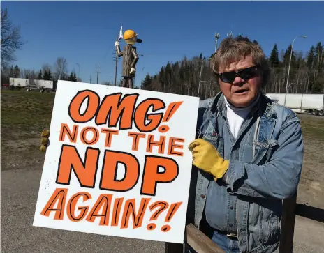  ?? CITIZEN PHOTO BY BRENT BRAATEN ?? Mark Makela from Rolla, B.C. is driving across the region putting up his own political signs. He is registered and has purchased the signs himself as a way to protest the possibilit­y of an NDP government.