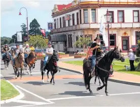  ?? ?? New Zealand Equestrian Advocacy Network co-chairman Arthur Yeo leads the riders through central Feilding last Friday.