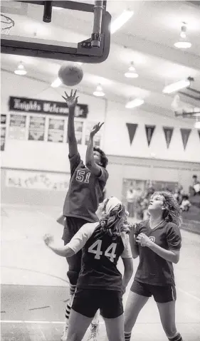  ?? GREG SORBER/JOURNAL ?? Olivia “O.J.” Jones scores two of her 24 points during Sandia’s 47-46 victory over Clovis in this 1979 New Mexico State Tournament game. Jones averaged better than 26 points and 14 rebounds during the 1978-79 season, earning several postseason honors.