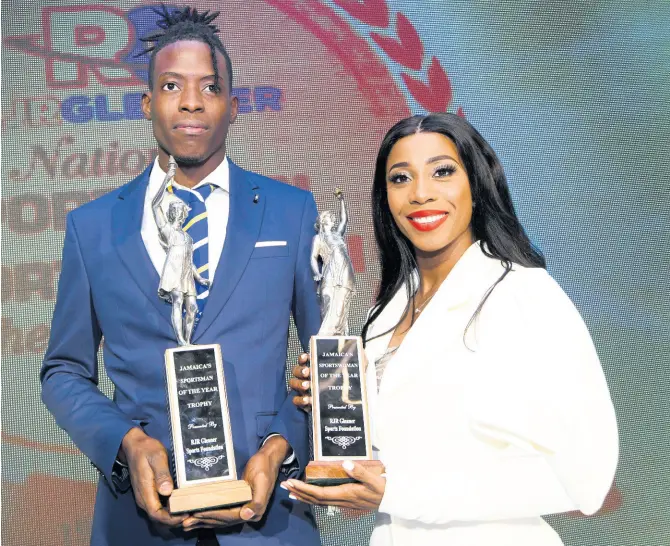  ?? RUDOLPH BROWN ?? National Sportsman of the Year 2019 Tajay Gayle and Sportswoma­n of the Year 2019 Shelly- Ann Fraser-Pryce pose with their trophies at the RJRGLEANER Sports Foundation awards function, which was held at The Jamaica Pegasus hotel in New Kingston last Friday night.