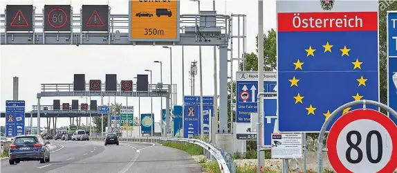  ?? (Georges Schneider/Xinhua) ?? Vehicles are about to cross the border between Austria and Hungary to enter Nickelsdor­f, Austria, on June 16, 2020.