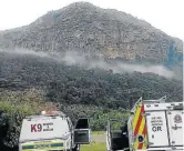  ?? / SUPPLIED ?? Police and emergency service’s rescue teams at the bottom of the Mpembeni mountain, Eastern Cape, where the bodies of a missing couple were found after their car had crashed.