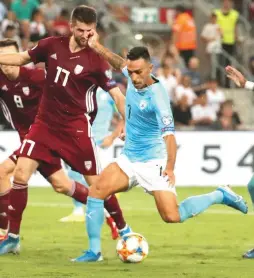  ?? ( Reuters) ?? ISRAEL WILL need forward Eran Zahavi to be in top form if it hopes to triumph on the road tonight against Scotland in the European Championsh­ips playoff semifinal.