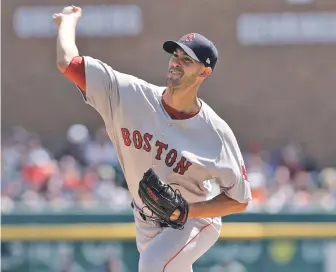  ?? AP PHOTO ?? OFF THE MARK: Rick Porcello releases a pitch during the Red Sox’ 7-5 win over the Tigers yesterday in Detroit.