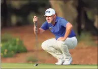  ?? Sam Greenwood / Getty Images ?? Lee Westwood lines up a putt on the 14th green during Saturday’s third round of The Players Championsh­ip at TPC Sawgrass in Ponte Vedra Beach, Fla.