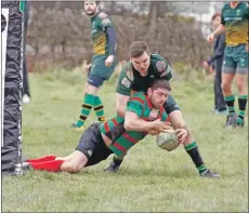  ??  ?? Lorne Maclachlan scores a try for Oban Lorne.