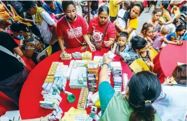  ?? (Arnold Quizol) ?? WORLD DAY OF THE POOR – Free medical services, medicines, haircut, and food are provided during the pre-world Day of the Poor program at the San Vicente de Paul Parish in Manila, on Saturday, Nov. 18, 2023. World Day of the Poor, which is celebrated every Nov. 19, was instituted by Pope Francis in 2017.