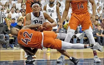  ?? Matt Freed/Post-Gazette ?? Au’Diese Toney fights Virginia Tech’s Ty Outlaw for a rebound in the Panthers’ loss Saturday.