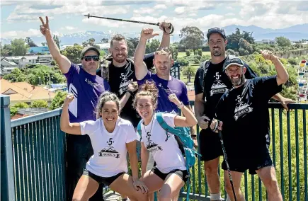  ?? DOUG FIELD/STUFF ?? Tackling a five-peaks-in-five-days challenge to raise money for the New Zealand Mental Health Foundation are, clockwise from left, Andrew Norton, Steve Anderson, Willie Stone, Hamish Norton, Josh Drummond, Becky Talbot and Rymi Sakimura.