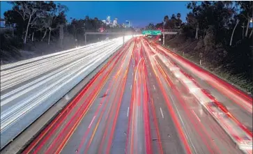  ?? Ricardo DeAratanha Los Angeles Times ?? PERHAPS L.A. could institute congestion pricing, which discourage­s driving at peak hours by charging a fee. That money could go toward transit projects. Above, the 10 Freeway from the 6th Street overpass in L.A.