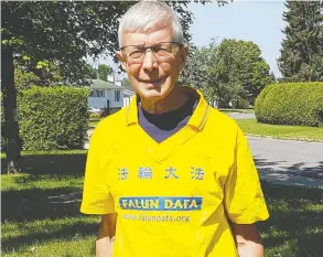  ??  ?? Gerry Smith wearing the Falun Gong T-shirt he says the CEO of Ottawa’s Dragon Boat festival ordered him to take off, citing in part China’s sponsorshi­p of the popular event.