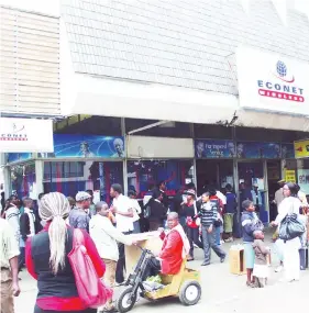  ??  ?? Econet branch along First Street in Harare remains one of the company’s busiest outlets where customers receive various services