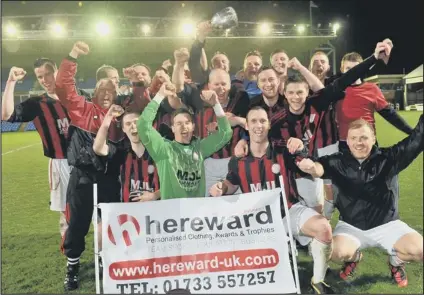  ??  ?? SINGING IN THE RAIN: Pinchbeck celebrate their PFA Senior Cup Final success at London Road last night.