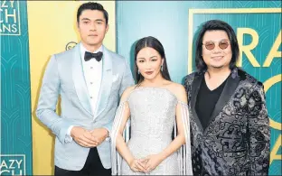  ?? AP PHOTO ?? Henry Golding, from left, Constance Wu and executive producer/author Kevin Kwon arrive at the premiere of “Crazy Rich Asians” at the TCL Chinese Theatre on Tuesday, Aug. 7, in Los Angeles.