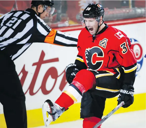  ?? — CP FILES ?? A broken finger could sideline Calgary Flames forward Troy Brouwer for three to four weeks.