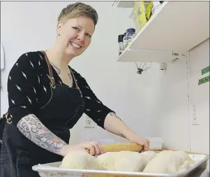  ?? MILLICENT MCKAY/JOURNAL PIONEER ?? Sarah Bennetto O’Brien, owner and operator of the Handpie Company, prepares a fresh batch of handpies. Bennetto’s company, as well as nine other recipients, received a portion from the McCain Foods Adjustment Fund after government dispersed the funds.