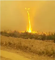  ?? — Reuters photo ?? File photo shows a fire tornado is seen in Vanderhoof.