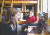  ?? Jessica Christian / The Chronicle ?? Cal freshman Lily Garelick ( left) and her roommate, Aleema Farmanali, study remotely in March amid the pandemic in their dorm on the Berkeley campus.