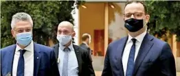  ??  ?? German Health Minister Jens Spahn (R) and the president of the Germany’s Robert Koch Institute (RKI) Lothar Wieler (L) wear face masks as they arrive for a press conference on October 8, 2020 in Berlin (AFP)