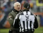  ?? NAM Y. HUH — THE ASSOCIATED PRESS ?? Chicago Bears head coach John Fox argues a call with line judge Bart Longson (2) during the first half of an NFL football game against the Green Bay Packers, Sunday in Chicago.