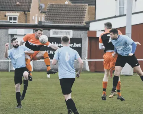  ??  ?? RCA Grangetown Florists (blue) in action against Witton Park Rose & Crown, back in March before last season was curtailed.