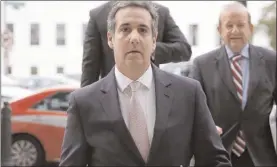  ?? The Associated Press ?? In this 2017, file photo, Michael Cohen, President Donald Trump’s personal attorney, arrives on Capitol Hill in Washington. Cohen, is challengin­g porn actress Stormy Daniel’s unsubstant­iated charge that someone tied to Trump threatened her with...