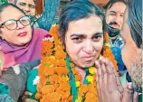  ?? PTI ?? AAP candidate Suman Devi reacts after winning the municipal corporatio­n elections in Chandigarh on Monday. —
