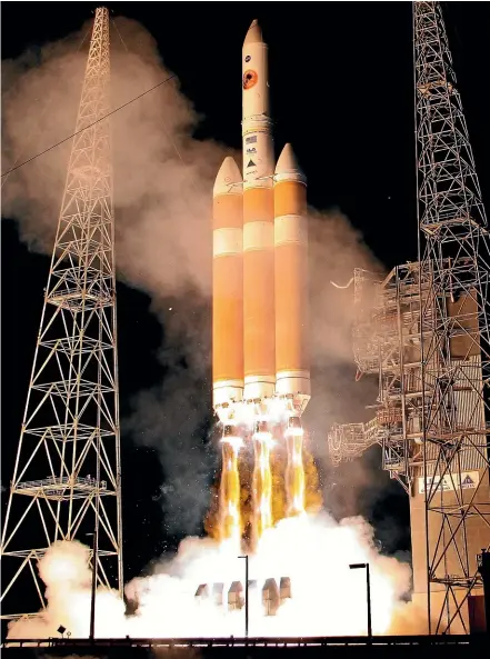  ?? AP ?? A Delta IV rocket, carrying the Parker Solar Probe, lifts off from launch complex 37 at the Kennedy Space Centre.