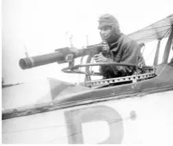  ??  ?? Right: A Canadian airman practices using a Hythe MK III camera gun. The camera replicated the feel of a Lewis gun and was used to train pilots to become better shots.