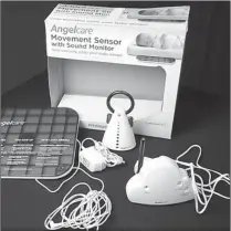  ?? Associated Press ?? This image provided by the Consumer Product Safety Commission shows an Angelcare Movement and Sound Baby Monitor. The Consumer Product Safety Commission is recalling the baby monitor because the cord attached to the baby monitor’s sensor pad is placed...