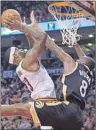  ?? AP PHOTO ?? Cleveland Cavaliers’ Lebron James, left, is blocked at the rim by Toronto Raptors’ Bismack Biyombo during Wednesday’s game in Toronto.