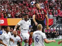  ?? CURTIS COMPTON / CCOMPTON@AJC.COM ?? Defender Miles Robinson, who has been sidelined with a hamstring injury, is riding an exercise bike but is not yet ready to return to the Atlanta United lineup.