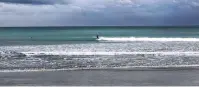  ??  ?? Colac Bay is a popular surfing spot. In the middle of the day on Tuesday, 10 people were out catching waves.