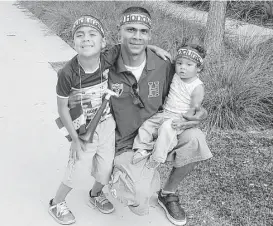  ?? Courtesy photo ?? Henry Alvarado, with his children Cherry Rodriguez and David Alvarado last year, likely was qualified for a work permit under new deportatio­n guidelines.