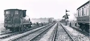  ?? BLUEBELL RAILWAY MUSEUM ARCHIVE ?? Having completed its melancholy task of helping to lift the line from Horsted Keynes, No. 2650 peers towards East Grinstead in March 1965, before being transporte­d back to the Bluebell Railway by road.