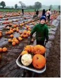  ??  ?? Right: Judy’s son Eric with pumpkins