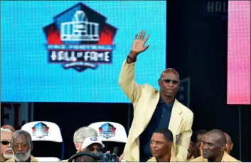  ??  ?? In this 2014 file photo, enshrinee Eric Dickerson is introduced during Football Hall of Fame enshrineme­nt ceremony, in Canton, Ohio.AP Photo/DAVID RIchARD