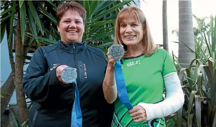  ??  ?? Kerikeri netballers Susan Pieterse and Diane Burgess with their silver medals.