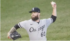  ?? KAMIL KRZACZYNSK­I/AP ?? White Sox starting pitcher Dallas Keuchel picked up his fourth win.