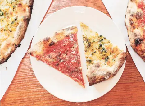  ?? Jen Fedrizzi / Special to The Chronicle ?? Tomato Pie and Clam Pie slices at Pazzo in San Carlos.