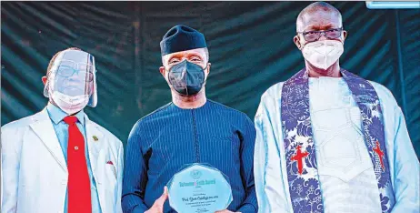  ??  ?? PFN past President Rev. Felix Omobude ( left); Vice President Yemi Osinbajo and new PFN President Bishop Francis Wale Oke at the 16th Pentecosta­l Fellowship of Nigeria Biennial Conference in Enugu… yesterday.